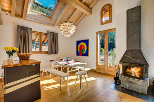 Dining area with fireplace | Penthouse Apartment – ​​Luxury and Exceptional Panorama