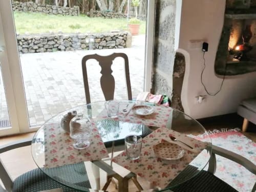 Dining table with utensils and outside view | Relax and Unwind in Ti Chôa - Casa da Mata
