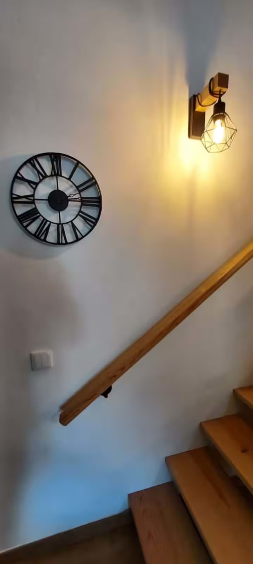 Stairs with wall light and wall clock | Escape to Tranquility at Ti Chôa - Anexo (Palheiro)