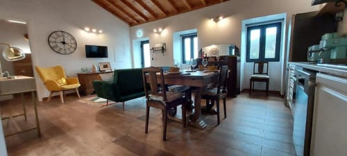 Dining area, living area and television | Embrace Comfort and Style at Ti Chôa - Casa da Praça

