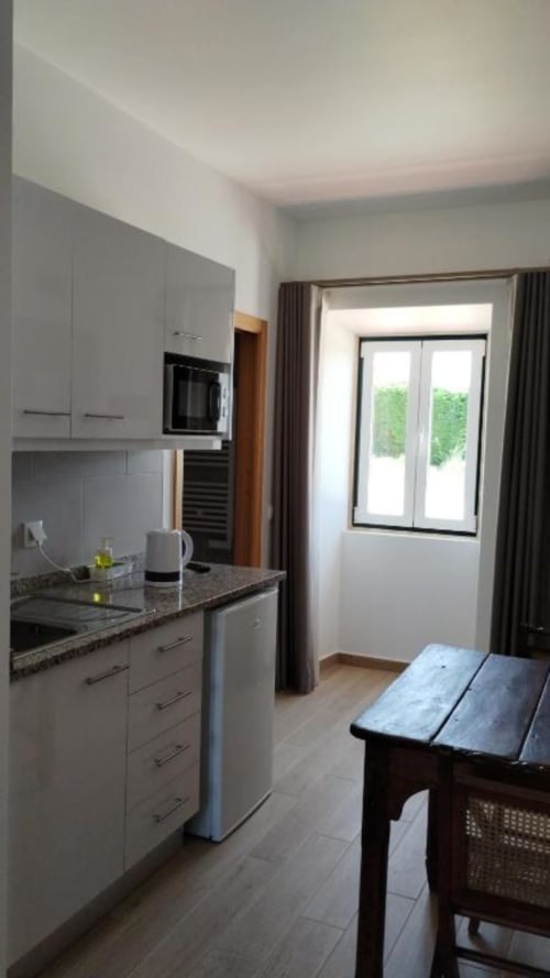 Kitchen with dining area | Large Double or Twin Room with Countryside Charm in Óbidos