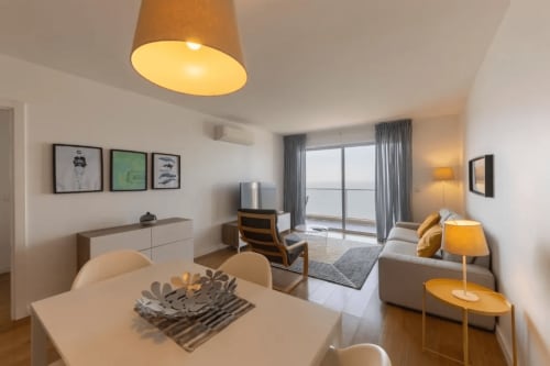 Living area, dining area and kitchen of the apartment | Unwind in Our Stunning Apartment with Breathtaking Sea Views



