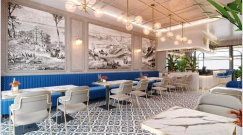 Moderne eetkamer in La Maison D'ambrine B&B in Chamaret met blauwe bankzitplaats, crèmekleurige stoelen en vintage botanische inrichting