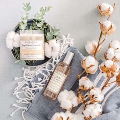 Luxury skincare and cotton products displayed with eucalyptus at La Maison D'Ambrine, a boutique B&B in Chamaret, France