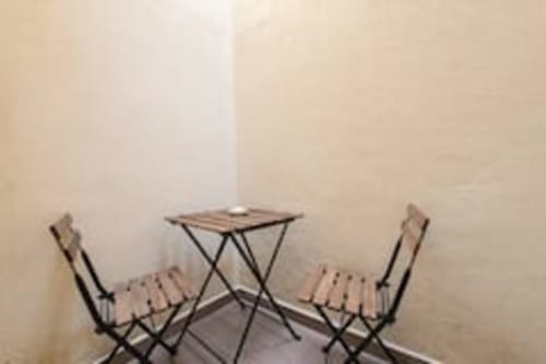 Table and chairs | Modern Comfort in the Bustling City Center