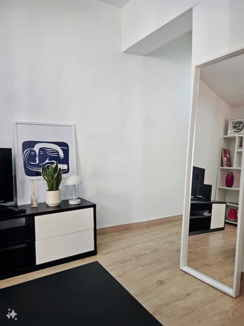 Big mirror on the living area of the property | Modern Comfort in the Bustling City Center
