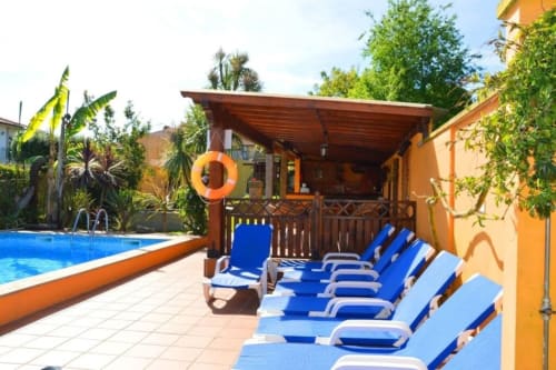 Multiple pool bench to relax | Casa da Pedrosa: Your Ideal Retreat in Ponte de Lima, Portugal