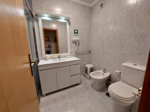 Bathroom with sink and toilet | Silver Waves – Seaside Luxury Retreat in Portugal