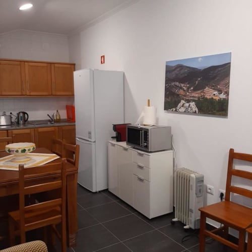 Kitchen, dining area and appliances | Welcome to Casa Rural "A Escola" – Your Tranquil Retreat in Pampilhosa da Serra
