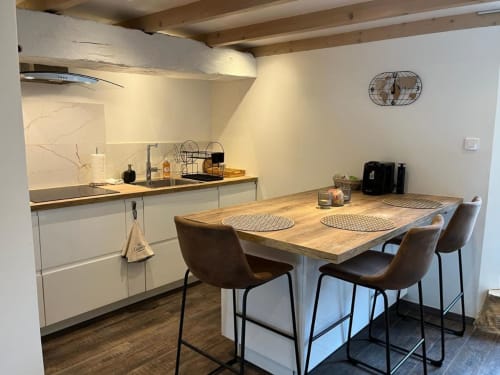 Kitchen with dining table | La Petite Maison: Cozy Charm for an Intimate Escape