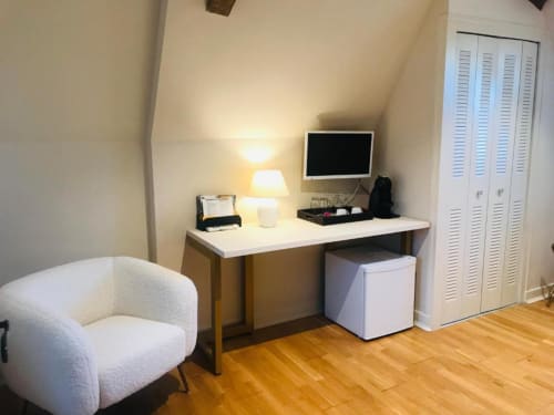 Office table with sofa chair | Relax in the Comfort of the Climate Room at Domaine Pont Juillet