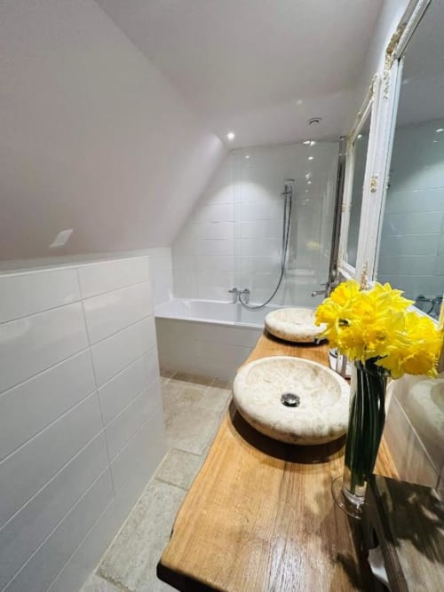 Spacious bed with sink and bath tub | Experience Elegance in the Prestige Room at Domaine Pont Juillet