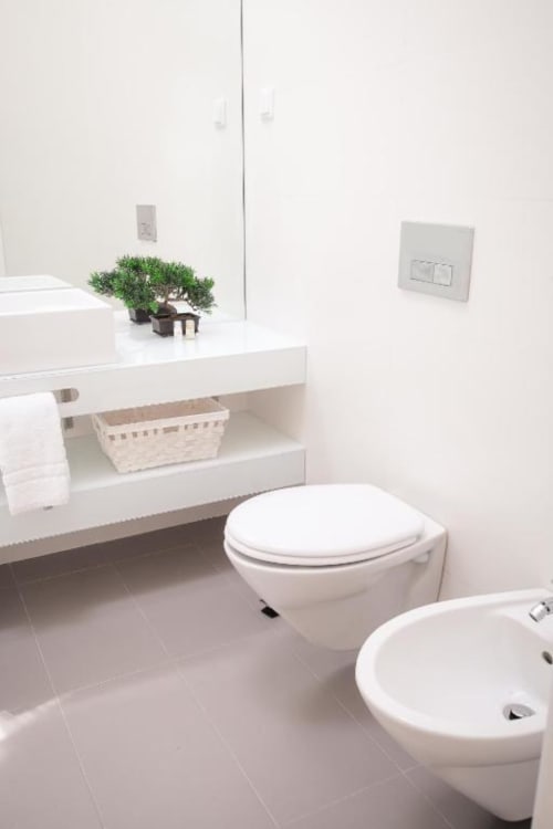 Bathroom with toilet and sink | Experience Comfort and Style at Loving Chiado 1 in Lisbon