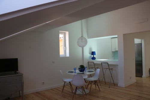 Dining table and kitchen | Experience Comfort and Style at Loving Chiado 1 in Lisbon