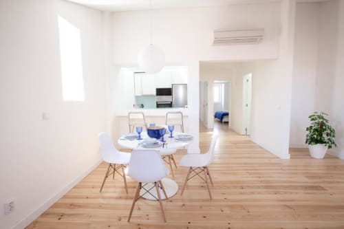 Dining table, kitchen, and bedroom view | Experience Comfort and Style at Loving Chiado 1 in Lisbon