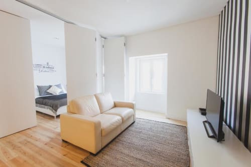 Bedroom and living area | Relax and Unwind at Loving Chiado 2 – Your Perfect Lisbon Stay