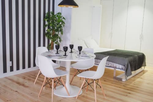 Dining area and bed | Relax and Unwind at Loving Chiado 2 – Your Perfect Lisbon Stay