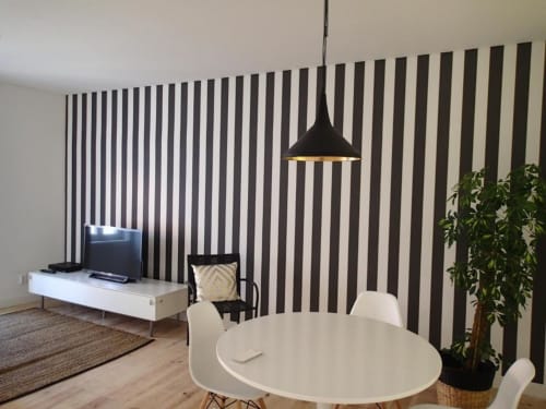 Dining table and television | Relax and Unwind at Loving Chiado 2 – Your Perfect Lisbon Stay