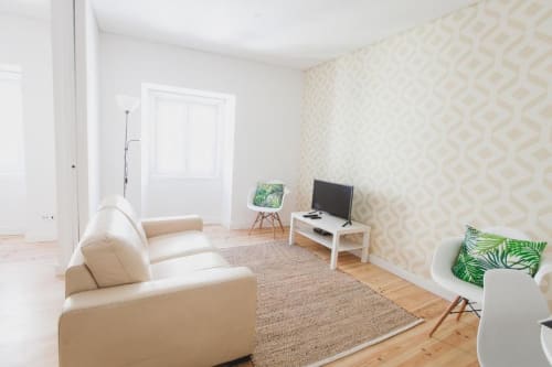Living area with television | Charming and Modern Living at Loving Chiado 4 in Lisbon
