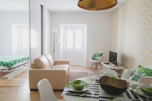 Living area, dining table and bedroom | Charming and Modern Living at Loving Chiado 4 in Lisbon