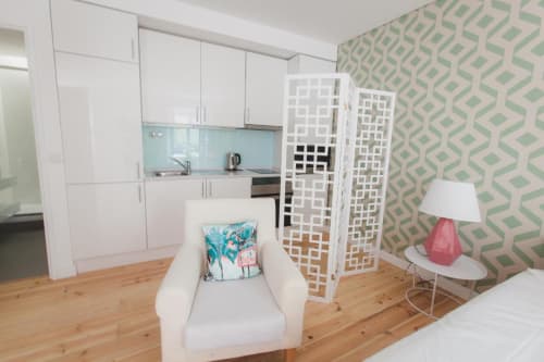Kitchen and comfortable chair | Loving Chiado 5 – Your Cozy Escape in the Heart of Lisbon
