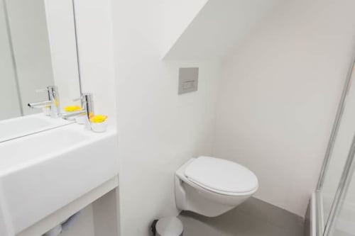 Bathroom with toilet and sink | Enjoy Luxury and Comfort at Loving Chiado 6, Lisbon