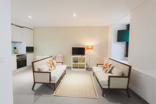Living area and kitchen | Enjoy Luxury and Comfort at Loving Chiado 6, Lisbon