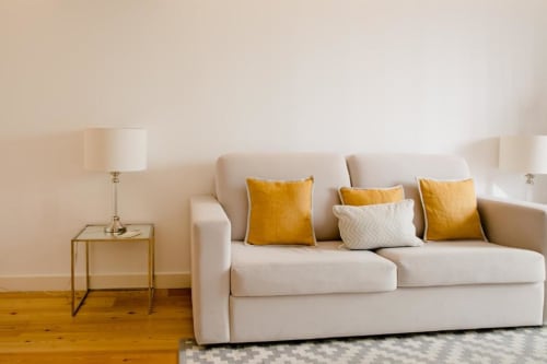 Comfortable sofa bed | Discover Loving Chiado 7 – A Modern Retreat in Lisbon