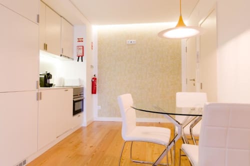 Dining area and kitchen | Bedroom | Discover Loving Chiado 7 – A Modern Retreat in Lisbon