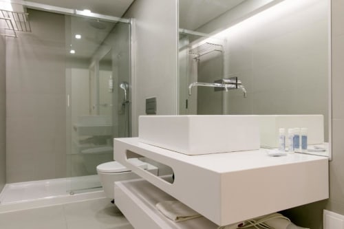 Bathroom and shower area | Loving Chiado 9 – A Perfect Blend of Comfort and Elegance in Lisbon