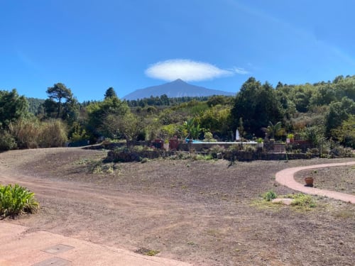 Volcanic landscape at Casonas de marengo cottage in Icod de los Vinos with Teide mountain view, gardens, and terraced grounds