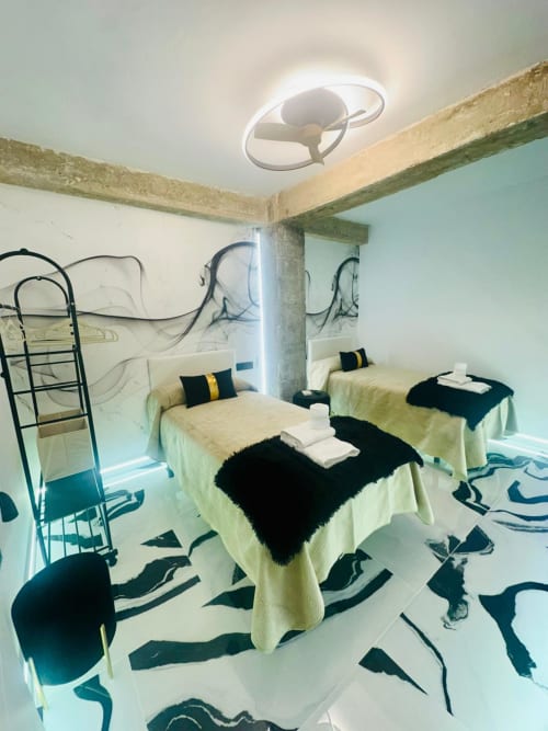 Apartamento Gestyp-AT en Mérida con camas individuales, ventilador moderno y diseño artístico de piso