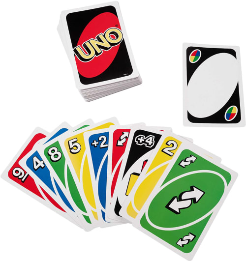 UNO card game set with deck, hand of colorful cards, and wild card at Îlot Cosy and Spa