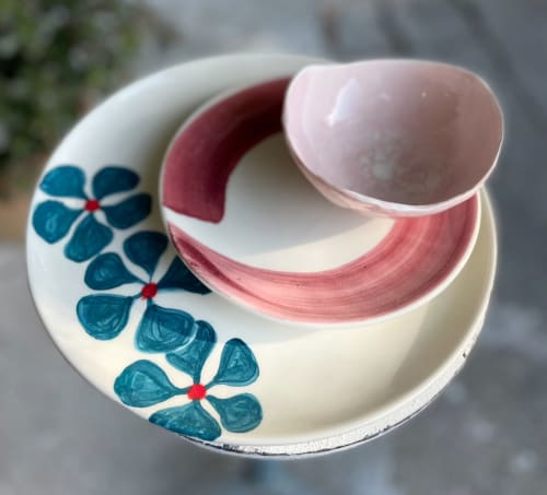 Elegant plated dessert with pink swirl and teal flowers at La Cascina di Bea, Torre Boldone