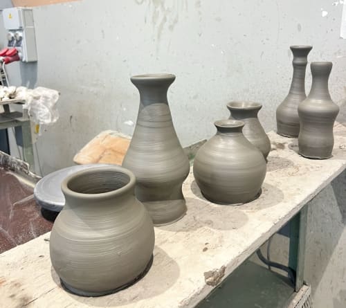 Handcrafted ceramic pottery pieces displayed at La Cascina di Bea, a rustic BnB in Torre Boldone, Bergamo, Italy.