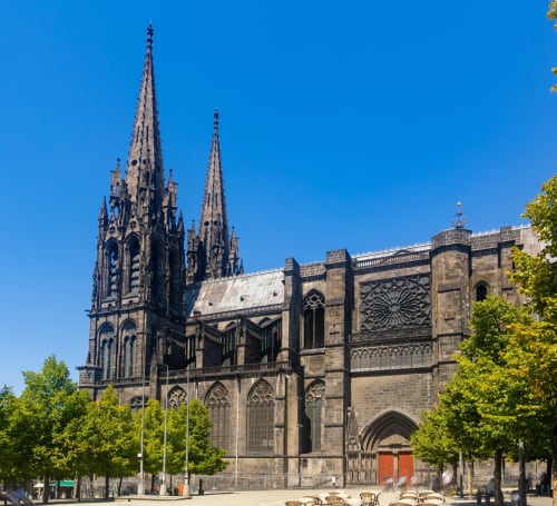 Gothic cathedral with twin spires in Riom, France near La Caravelle hotel