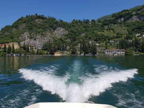Sailing the waters of Lake Como. A day on a boat soaking up the sun and refreshing swims.