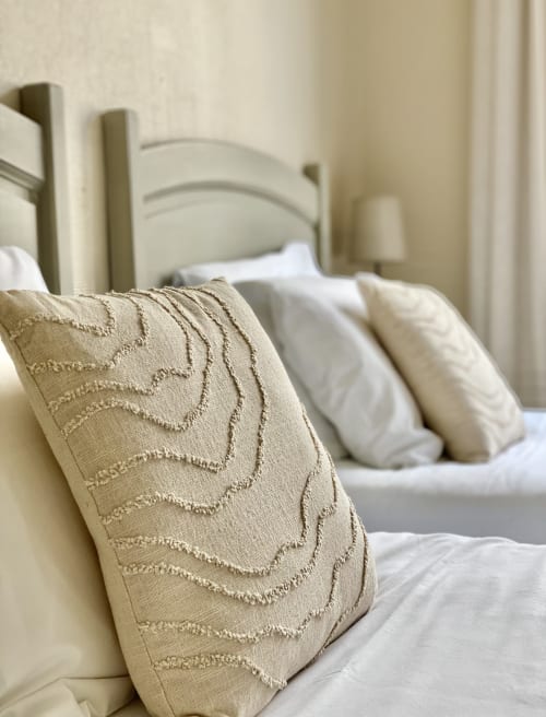 Beige decorative pillow on twin bed at Hôtel Maison Richet, Les Sables-d'Olonne
