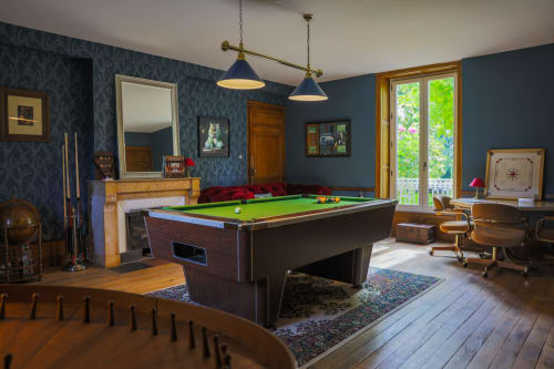 Salle de billard et de jeux dans le gîte et maison d'hôtes