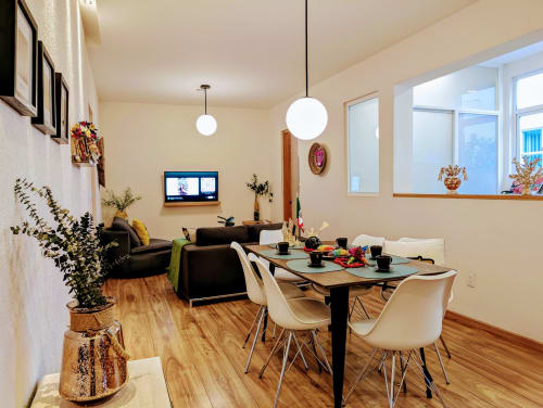 Penthouse Casa Donceles: comedor con cocina, sala de estar y vistas de la Ciudad de México