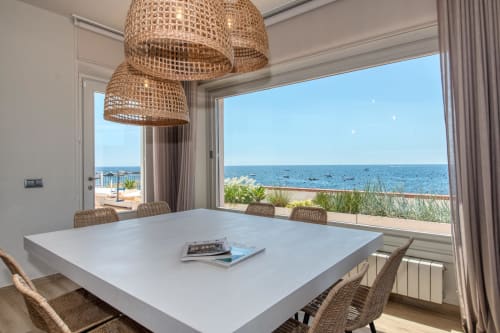 Modern dining room with sea views at Finques Garcia Enrich hotel in Palafrugell, Spain