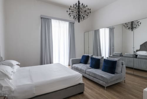 camera quadrupla, due camere separate, due letti matrimoniali, suite familiare, hotel per famiglie, spazio per gruppo, comfort, relax, stanze accoglienti, vacanza in famiglia, Noto, Sicilia
