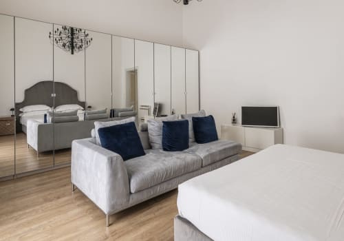 camera quadrupla, due camere separate, due letti matrimoniali, suite familiare, hotel per famiglie, spazio per gruppo, comfort, relax, stanze accoglienti, vacanza in famiglia, Noto, Sicilia
