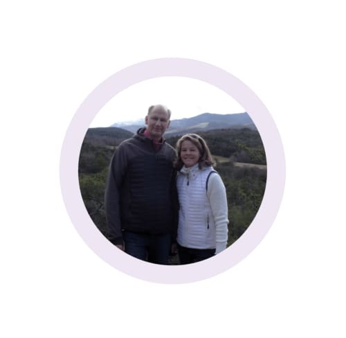 Couple smiling outdoors with rolling hills at L'Amiradou B&B, Félines-sur-Rimandoule
