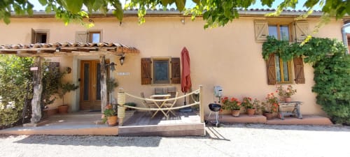 Orchids cottage at Les Gites de Campardon in Monties with terrace, wooden deck chairs, garden seating, and potted flowers