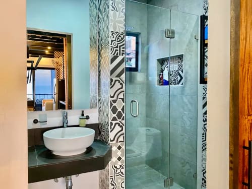 Modern bathroom in CUBO apartment at Anita Ocean View, Puerto Vallarta with vessel sink and walk-in shower