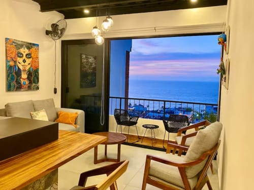 CUBO apartment at Anita Ocean View Puerto Vallarta with ocean view balcony, modern furnishings, and sunset sea views