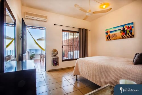 Burbuja apartment at Anita Ocean View Puerto Vallarta with sea view balcony, queen bed, AC, TV and modern amenities