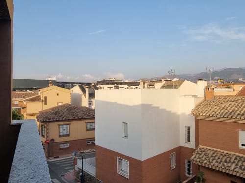 Boabdil House cottage at CTH Granada in Armilla with terrace overlooking city rooftops and mountain views