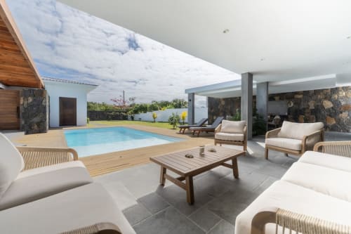 La Villa Boz luxury villa with pool, lounge seating, and covered terrace in Saint Philbert de Bouaine